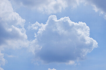 Naklejka na ściany i meble Blue sky with a cloud.