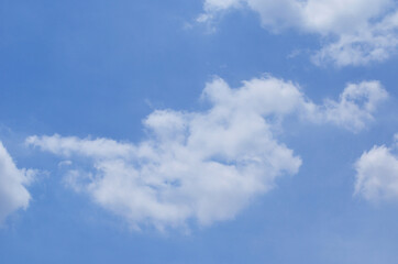 Blue sky with a cloud.
