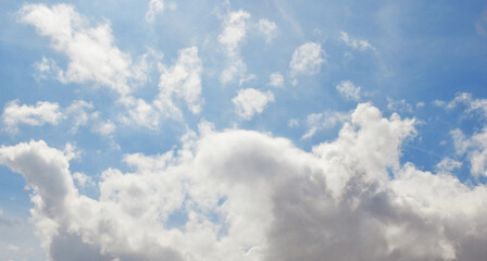 Blue sky with a cloud.