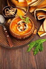 Vegetables soup with cabbage and mushrooms in bowl