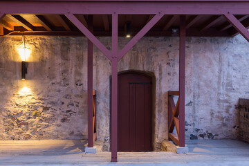 Detail of the basement entrance of a patrimonial house in the Petit-Champlain area of old town seen during an early spring morning, Quebec City, Quebec, Canada