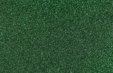 Green blurred shiny background. Color in trend. Colour. Sequins.