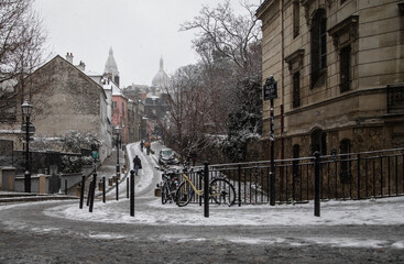 paris montmartre in the winter snowstorm rue de abreuvoir
