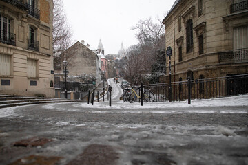 paris montmartre in the winter snowstorm rue de abreuvoir