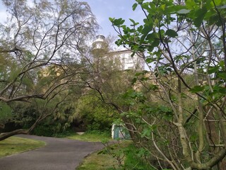 a white lighthouse on the mountain a blue sky day in spring in Guetaria, Basque Country, Spain