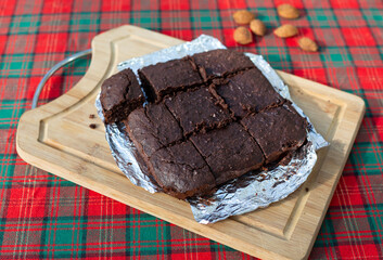 Brownies slices on cutting board, freshly baked
