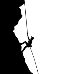 Silhouette young man climber climbs on rock.