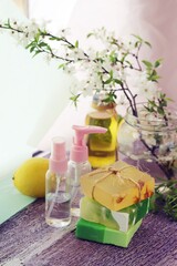 Useful plants, tinctures, lemon and spray on the table, home body care, healthy lifestyle, cleanliness