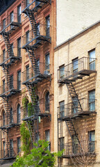 Fototapeta premium Old buildings with fire escapes, New York City, USA.