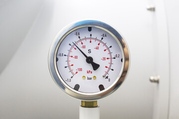 Vacuum pressure gauge meter details.Vacuum pressure gauge, part of vacuum chamber in laboratory.