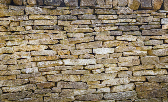 View of empty old dry stone wall background with copy space