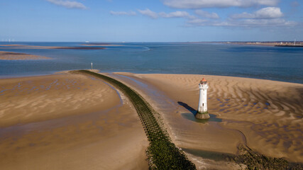 New Brighton Lighthouse (also known as Perch Rock Lighthouse situated at the confluence of the River Mersey and Liverpool Bay on an outcrop off New Brighton known locally as Perch Rock