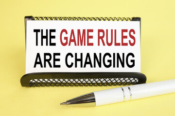 The Game Rules Are Changing. text on white paper on a yellow background
