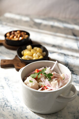 Very famous Peruvian dish that is made of chunky fish marinated in lemon and served as a starter.