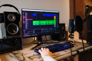 Workplace of musician at home. Table with pc and microphone