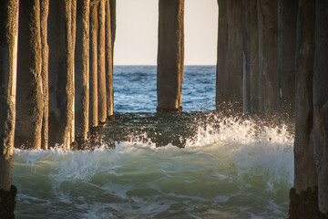 Waves crash against Manhattan Beach pier