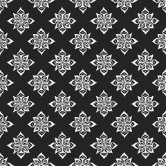 Vector seamless pattern with white abstract rhombus on black background