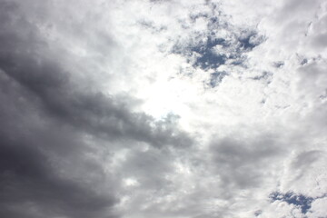 Obraz premium white puffy clouds with a blue path 