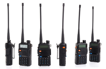 set collage of several black walkie-talkie radio communication device isolated on white background © Nana_studio