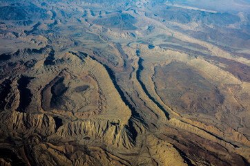 aerial view of desert mountains and canyon. Rocky geological formations. Arabian Peninsula