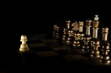 Chess pieces on the black background - obrazy, fototapety, plakaty