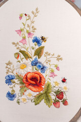 hand embroidered picture with meadow flowers in the hoop