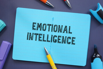 Business concept about Emotional Intelligence with sign on the page.