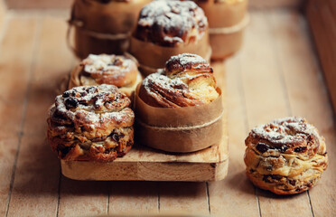Beautiful Easter craffins on wooden table.