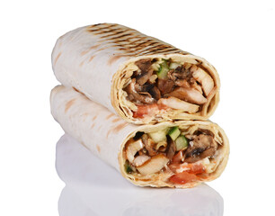 Shawarma doner kebab barbecue with vegetables on wooden black background