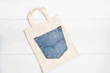 Old jeans upcycling idea. Crafting with denim, recycling old clothers, hobby, diy activity....