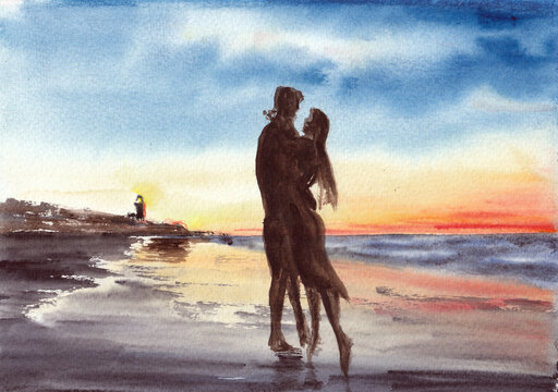 He and she on the beach in evening time, sunset over ocean