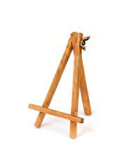 Wooden easel for paintings, mirrors or photo isolated on white background