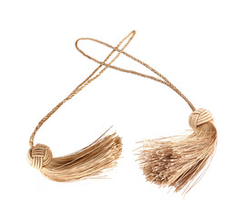 Two golden silk tassels isolated on white background for creating graphic concepts
