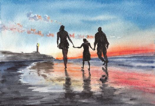 Family walking on the beach in evening time, sunset over ocean