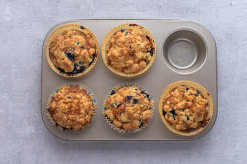 Delicious crumble muffins in baking form