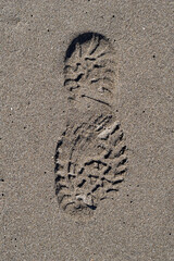 Isolated Print of Shoe Sole on Sandy Beach 