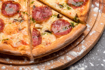 Pizza quattro stagioni with cheese, pesto and chiken
