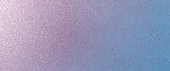 Water droplets on the film.