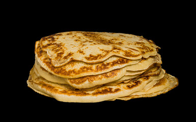 pancakes isolated on black background, side view