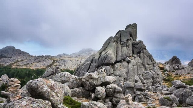 Clouds passing over the rocky granite peaks of Monte Limbara in Sardinia, Italy