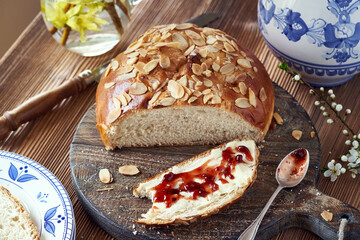 Mazanec, traditional Czech sweet Easter pastry, similar to hot cross bun, with butter and marmalade