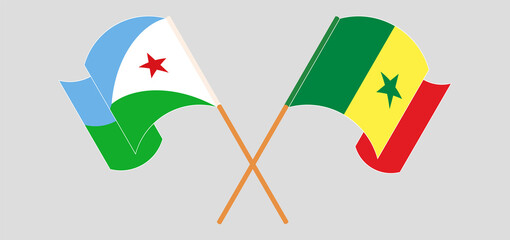 Crossed and waving flags of Djibouti and Senegal