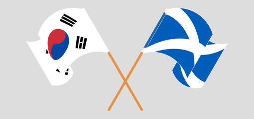 Crossed and waving flags of South Korea and Scotland
