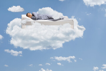 Man sleeping peacefully up in the clouds