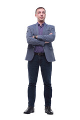 Smiling businessman standing with arms folded isolated on a white background