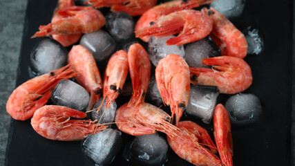 Fresh shrimps on ice. Shrimp in shells.