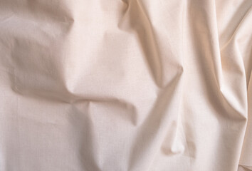 Light beige cotton fabric with pleats - wrinkles, flat layout