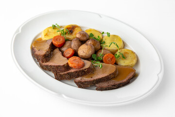 Sliced meat delicacies. Delicious beef, pork and poultry. Banquet festive dishes. Gourmet restaurant menu. White background.