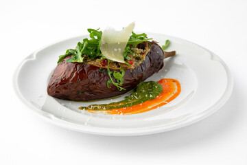 Eggplant baked with tomatoes, zucchini, parmesan. Banquet festive dishes. Gourmet restaurant menu. White background.
