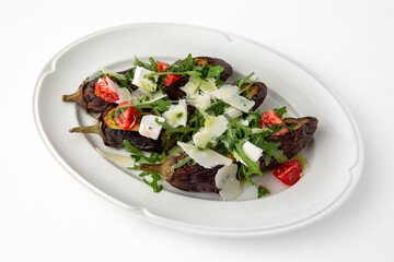 Eggplant baked with tomatoes, zucchini, parmesan. Banquet festive dishes. Gourmet restaurant menu. White background.